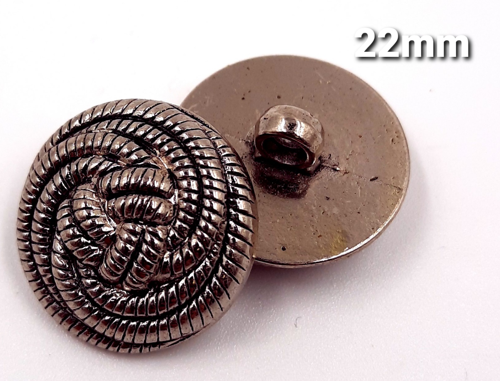 silver metal rope design button