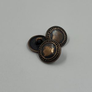 Metal button brass worn look