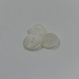 White iced effect button with rugged design