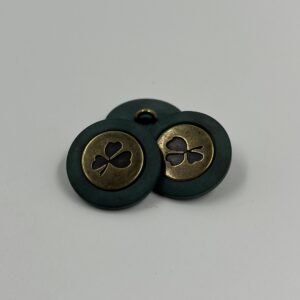 Coat button dark green resin with metal old gold shamrock motif