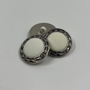 Coat Button, resin with silver effect floral wreath border and white centre