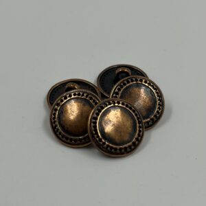Shirt button, metal brushed copper effect