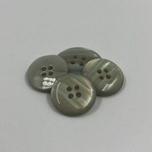 Coat button, disc shaped, iridescent