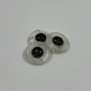 Shirt button, semi transparent marbled with antique bronze centre