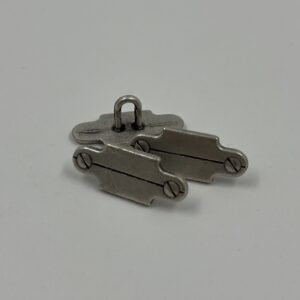 Coat button, metal pewter effect, unusual hinge like design