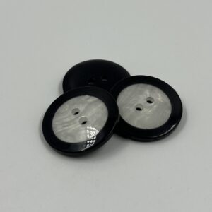 Coat button resin black with white centre pearl like finish