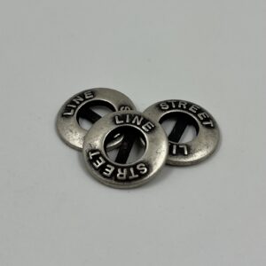 Coat button, metal, street line motif