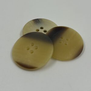 Coat button, bone effect two tone colouring