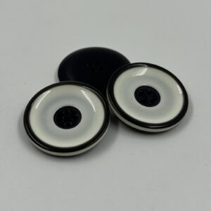Coat button, black and white enamel effect