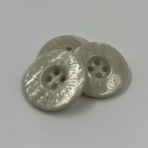 Coat button, resin, mother of pearl effect , recessed center